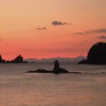 西伊豆・眼鏡岩の夕日シルエット