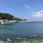 観音崎の透明な海と岬のパノラマ風景
